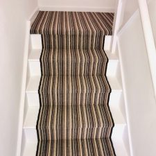 Earth stripe carpet fitted on stairs by Sargeant Carpets