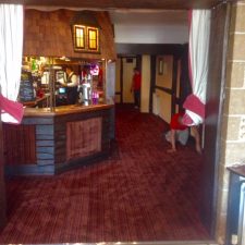 Bar area of the Beachcroft Hotel in Felpham fitted with merlot stripe Wilton carpet from the Stainsafe Super Wiltax range