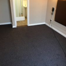 Dark grey heavy contract commercial carpet fitted to bedroom in the Beachcroft Hotel in Felpham