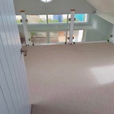 Neutral carpet by Brockway Carpets fitted to a beach house in East Wittering for Parnell Homes Limited.
