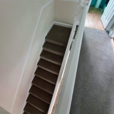 Grey wool twist carpet by Cormar Carpets fitted on stairs and landing.