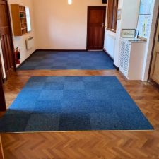 Sapphire coloured carpet tiles fitted in a chequerboard pattern at Rustington Methodist Church from the Felkirk heavy contract velour range. Made by Rawson Carpet Solutions and fitted by Sargeant Carpets.