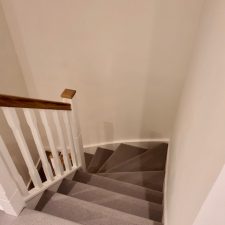 Staircase fitted with Avebury wool loop pile carpet.