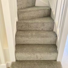 Persian doll grey colour carpet fitted to stairs from the Apollo Plus range by Cormar Carpets. Polypropylene twist fitted over Tredaire softwalk foam underlay for Crayfern Homes in Yapton
