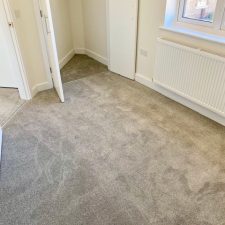 Persian doll grey colour carpet fitted by Sargeant Carpets. Polypropylene twist fitted over Tredaire softwalk foam underlay for Crayfern Homes in Yapton