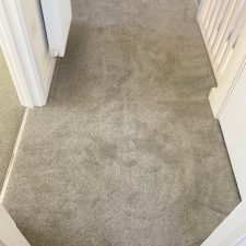 Persian doll grey colour carpet fitted to landing from the Apollo Plus range by Cormar Carpets. Polypropylene twist fitted over Tredaire softwalk foam underlay for Crayfern Homes in Yapton