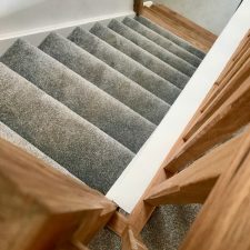 View down stairs of a grey carpet from the Primo Naturals range by Cormar Carpet
