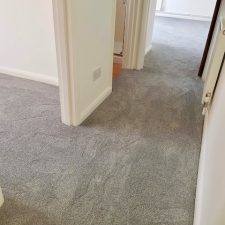 View of a landing fitted with a grey carpet by Associated Weavers's Vivendi range in Ardour quality, Chic Shadow.