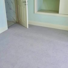 View of a bedroom fitted with a fine Worcester twist carpet by Adam Carpets in greystone glitter