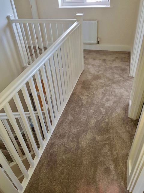 View of a landing fitted with a beige carpet from the Sensations range by Cormar Carpets in alpine stone