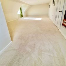 A loft room with sloping ceiling fitted with Luxury hardwearing IVivo nylon Saxony carpet, bleach cleanable pile