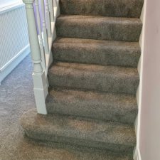 View of some stairs fitted with Solution dyed Ivivo nylon Saxony, Easy clean bleach cleanable, heavy duty Heather effect pile carpet.
