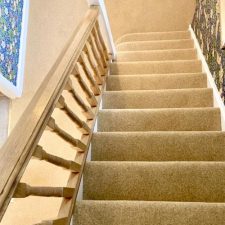 View down stairs fitted with a light brown woven Wilton carpet in 80% wool and 20% nylon pile. Extra heavy domestic quality, moth proofed.