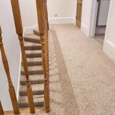 A landing fitted with a wool berber twist, extra heavy domestic carpet.