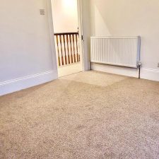 A bedroom fitted with a wool berber twist, extra heavy domestic carpet.