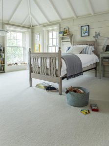 Bedroom with light cream walls, and light grey carpet from Primo Plus range in Misty Morning.