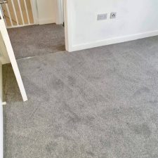A bedroom floor fitted with a grey Polypropylene, bleach cleanable twist pile carpet.