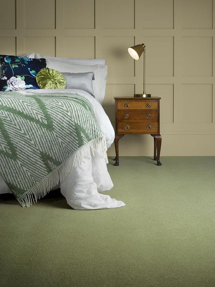 Bedroom fitted with Adam Carpets green carpet in the Adams Apple shade