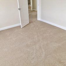 Beige polypropylene Saxony carpet fitted in living rooms
