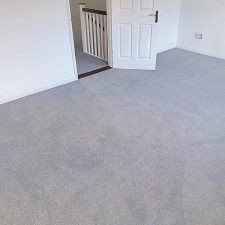 Carpet in French Grey shade fitted on upstairs landing and bedrooms.