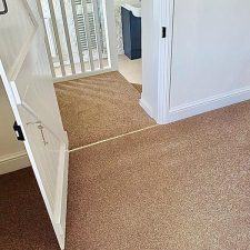 View of stairs fitted with a brown polypropylene twist, fade resistant carpet.