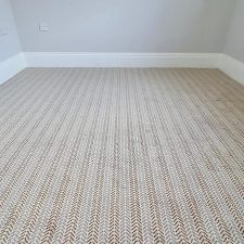 Woven Axminster bedroom carpet with herringbone design in neutral colours