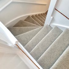 View down stairs fitted with a luxury feel grey, undyed wool carpet.