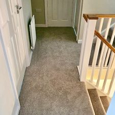 View of a landing and stairs fitted with a Polypropylene twist pile moth proof carpet