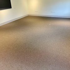 Living room fitted with a synthetic sisal propylene pile carpet with a gel backing