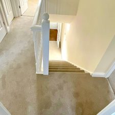 View down a flight of stairs fitted with a bleach cleanable moth resistant carpet