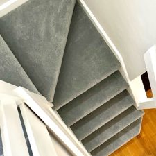 View down stairs fitted with a grey polypropylene twist pile carpet